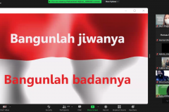 Saat menyanyikan Indonesia Raya dalam acara webinar diskusi publik nasional "mengkaji kebijakan indonesia terkait isu larangan ekspor batubara." Senin, 21 Februari 2022